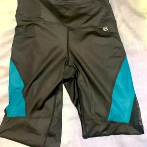 Black leggings with mesh side panels